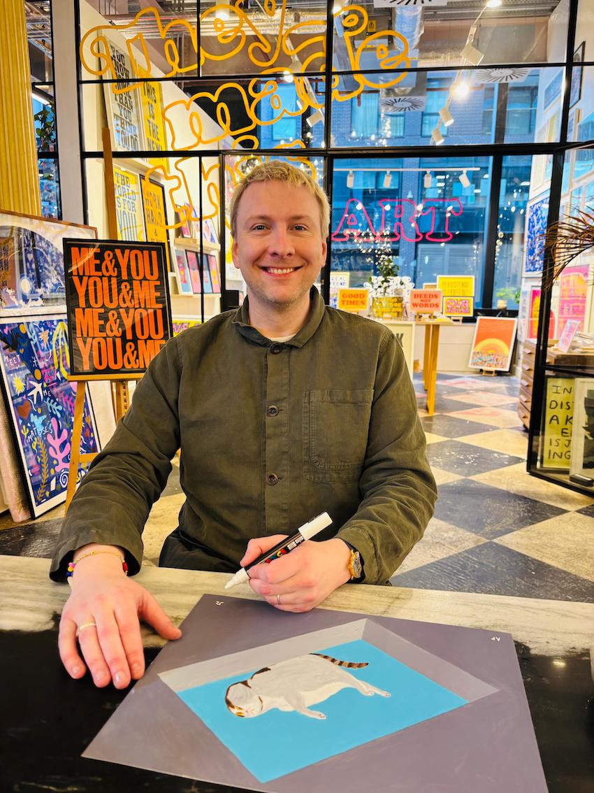 A cat having a little think while resting on a skylight on a hot summer's day - 2025 Re-edition