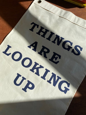 THINGS ARE LOOKING UP - NAVY ON WHITE HAND MADE FLAG